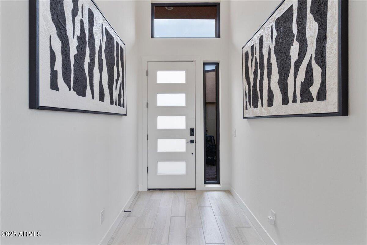 17237 East Desert Vista Trail Rio Verde, AZ 85263 - Photo 33 of 95 a view of an entryway with wooden floor