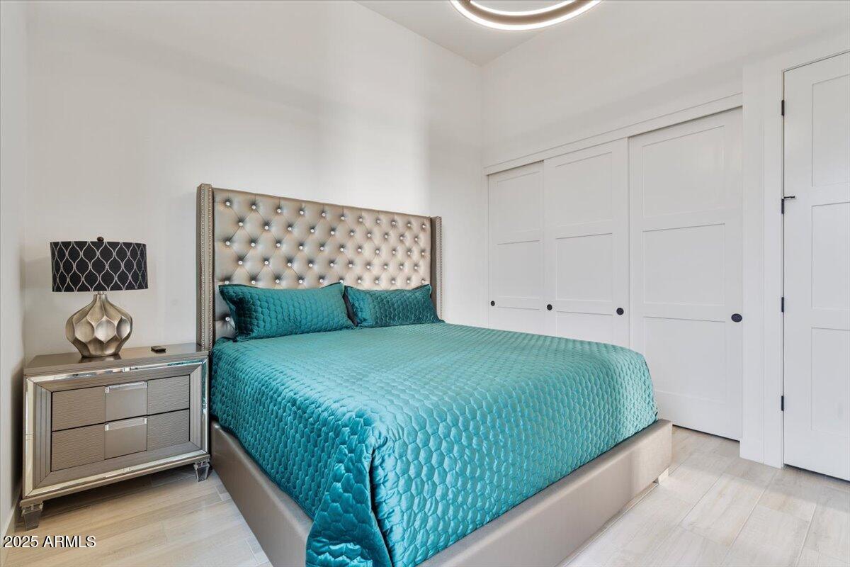 17237 East Desert Vista Trail Rio Verde, AZ 85263 - Photo 40 of 95 a bedroom with a bed and dresser