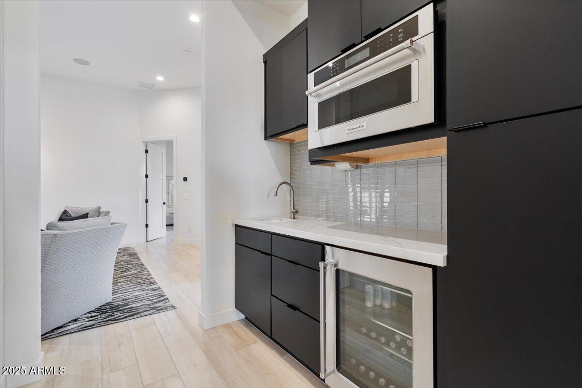 17237 East Desert Vista Trail Rio Verde, AZ 85263 - Photo 47 of 95 a kitchen with a sink and cabinets