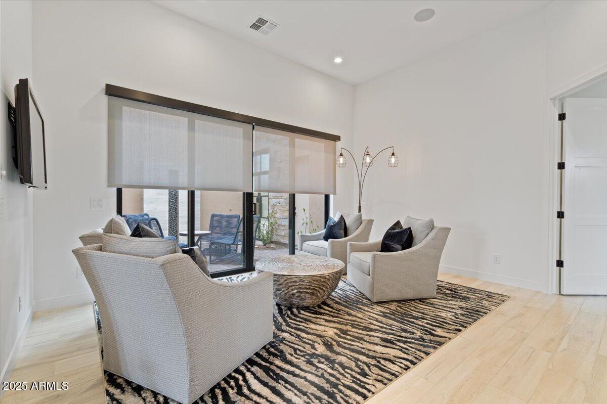 17237 East Desert Vista Trail Rio Verde, AZ 85263 - Photo 52 of 95 a living room with furniture and a large window