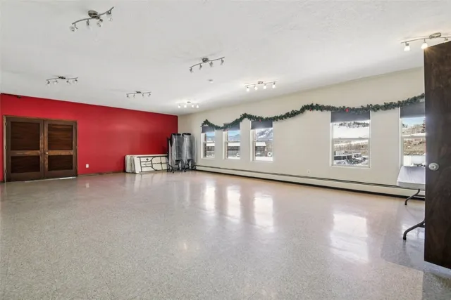 a view of a living room and dining room