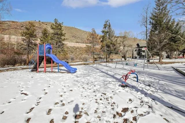 a view of a backyard of the house