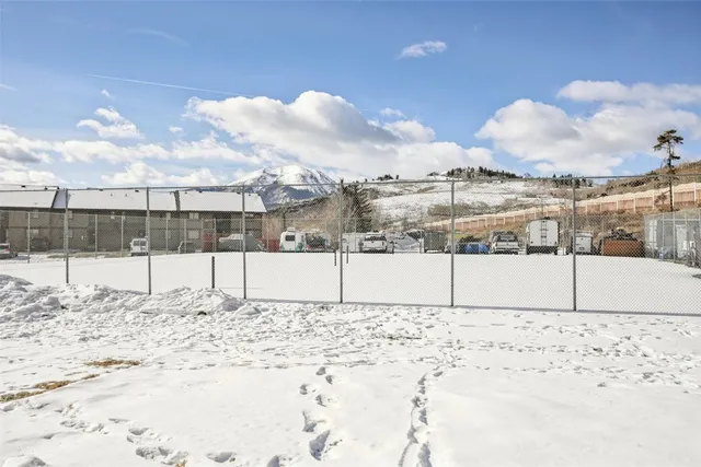 a view of a backyard of the house