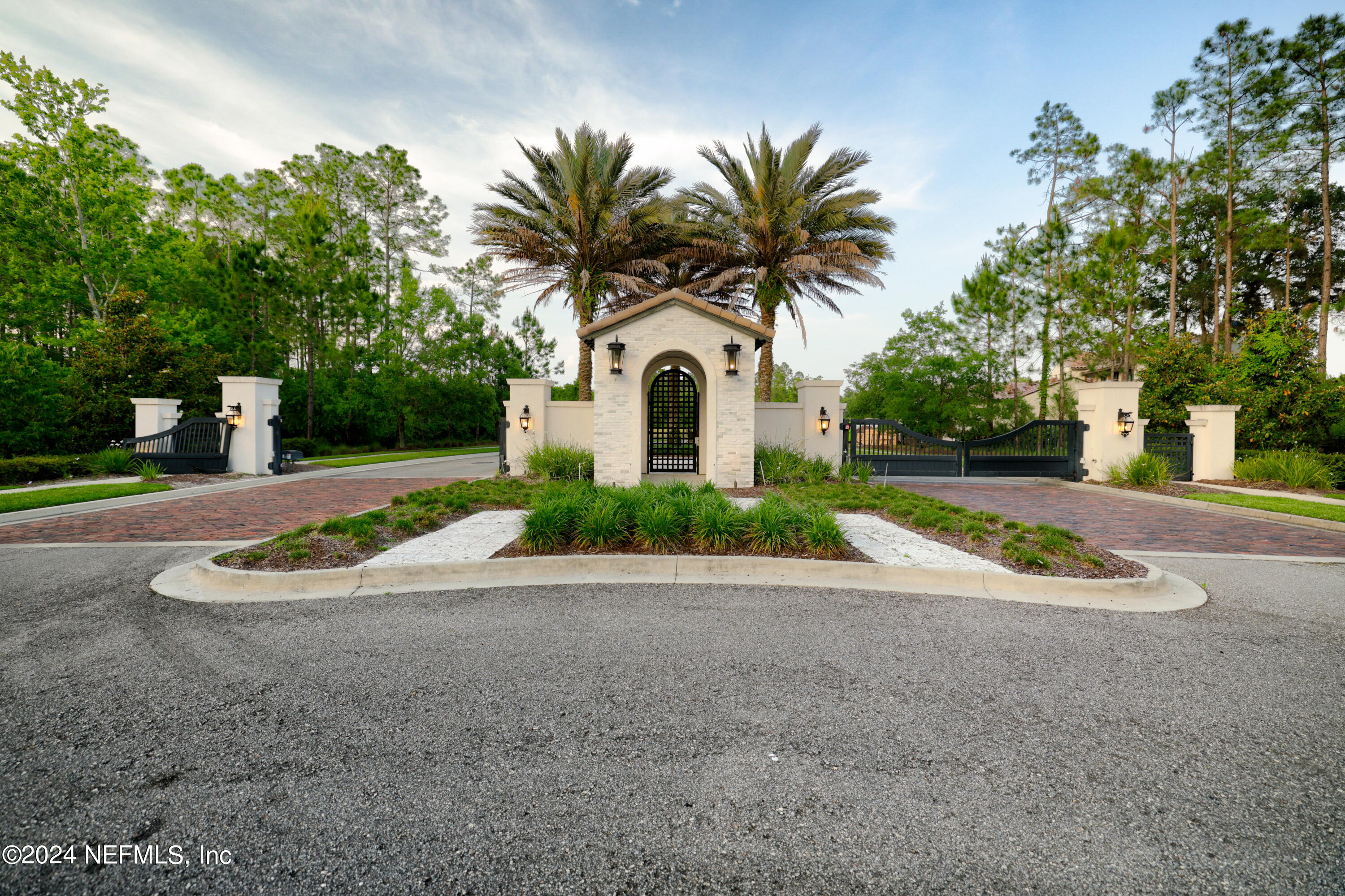92 Bear Point Ponte Vedra, FL 32081 - Photo 11 of 21 a house with a yard and palm trees