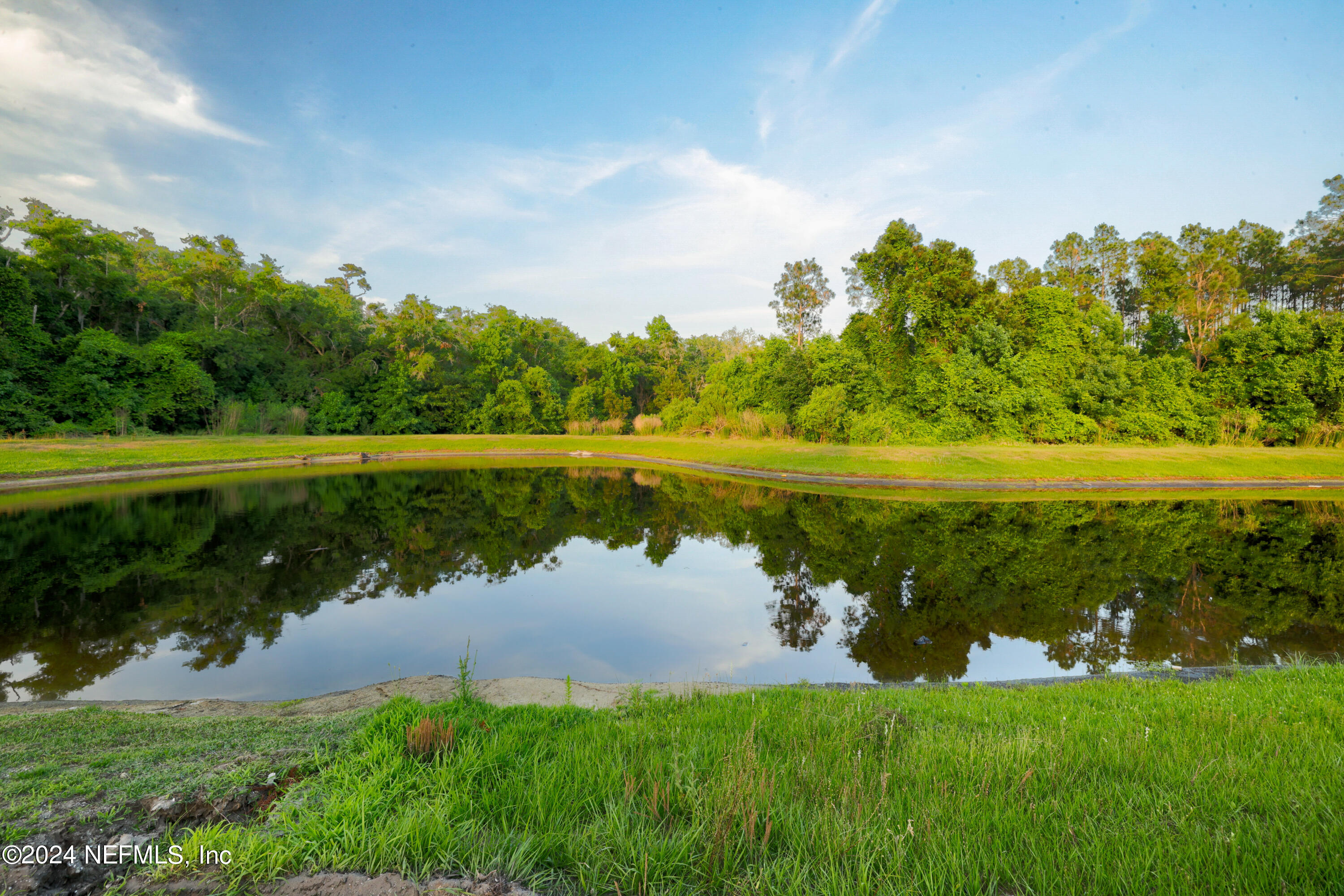 92 Bear Point Ponte Vedra, FL 32081 - Photo 2 of 21 a lake view with a big yard