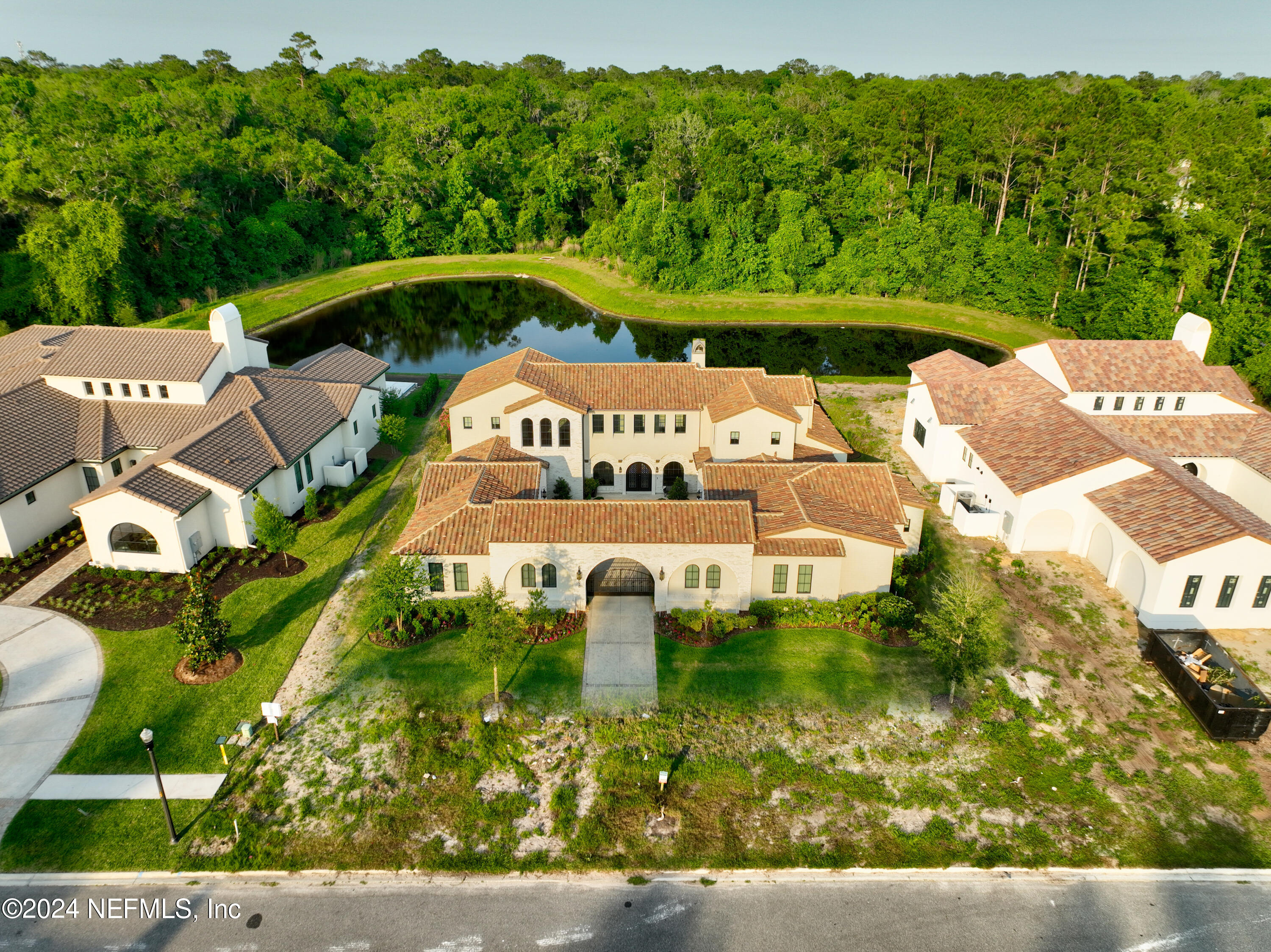 92 Bear Point Ponte Vedra, FL 32081 - Photo 3 of 21 an aerial view of a house a garden and lake view
