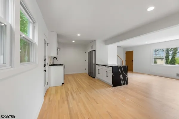 a view of a kitchen with a sink