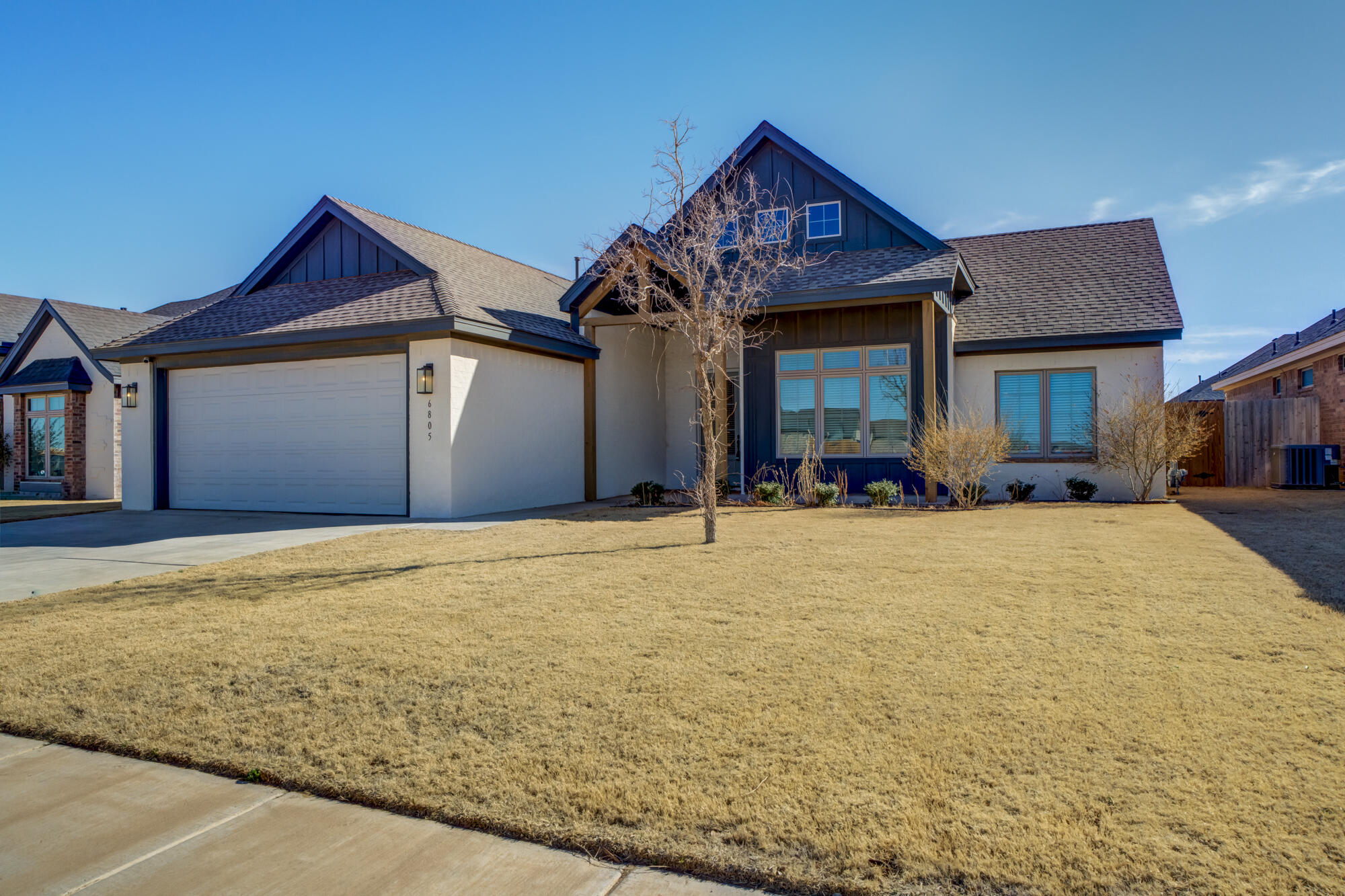 6805 51st Street Lubbock, TX 79407 - Photo 1 of 41 a view of a house with a yard