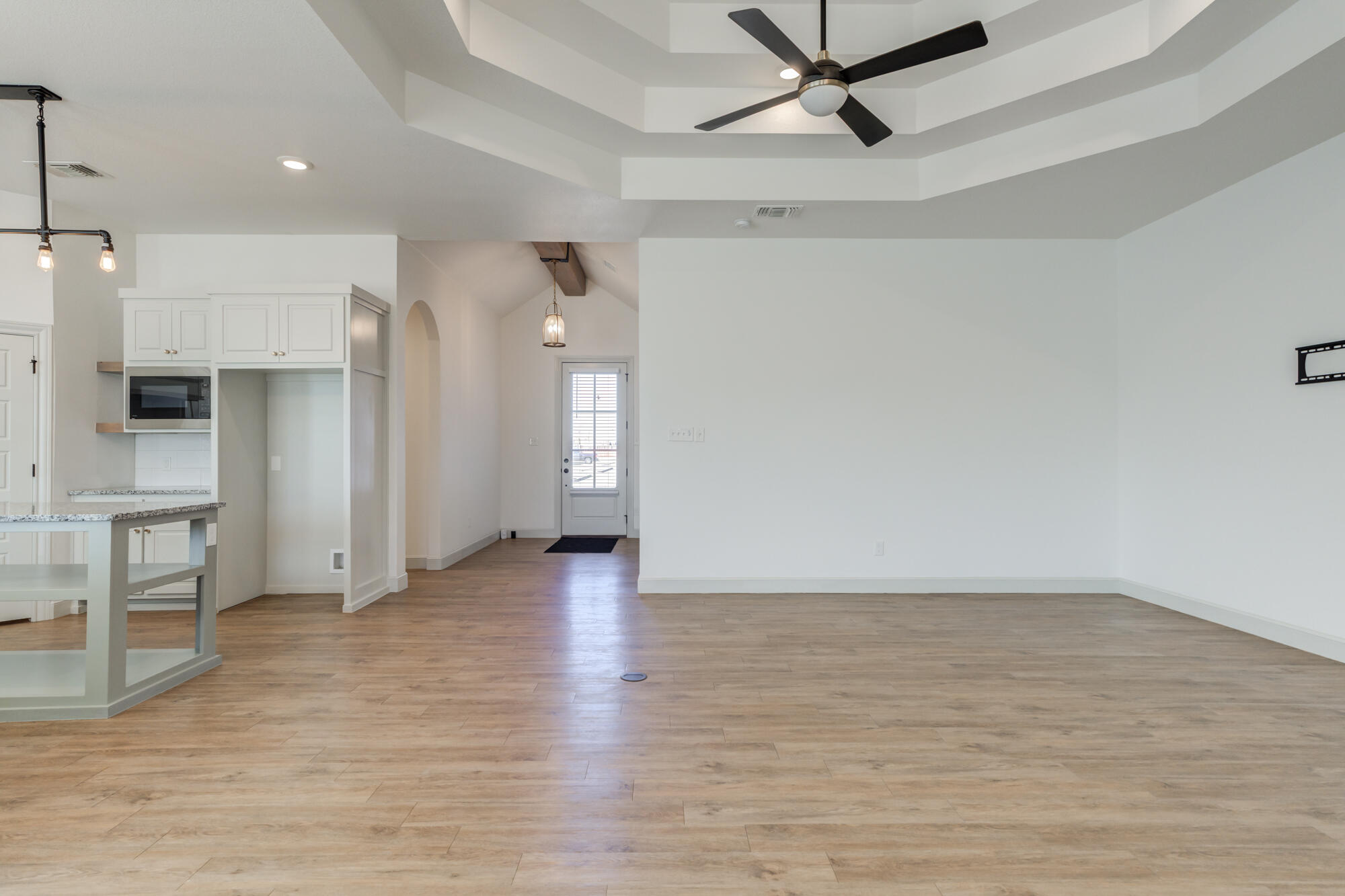 6805 51st Street Lubbock, TX 79407 - Photo 17 of 41 a view of an empty room with a window