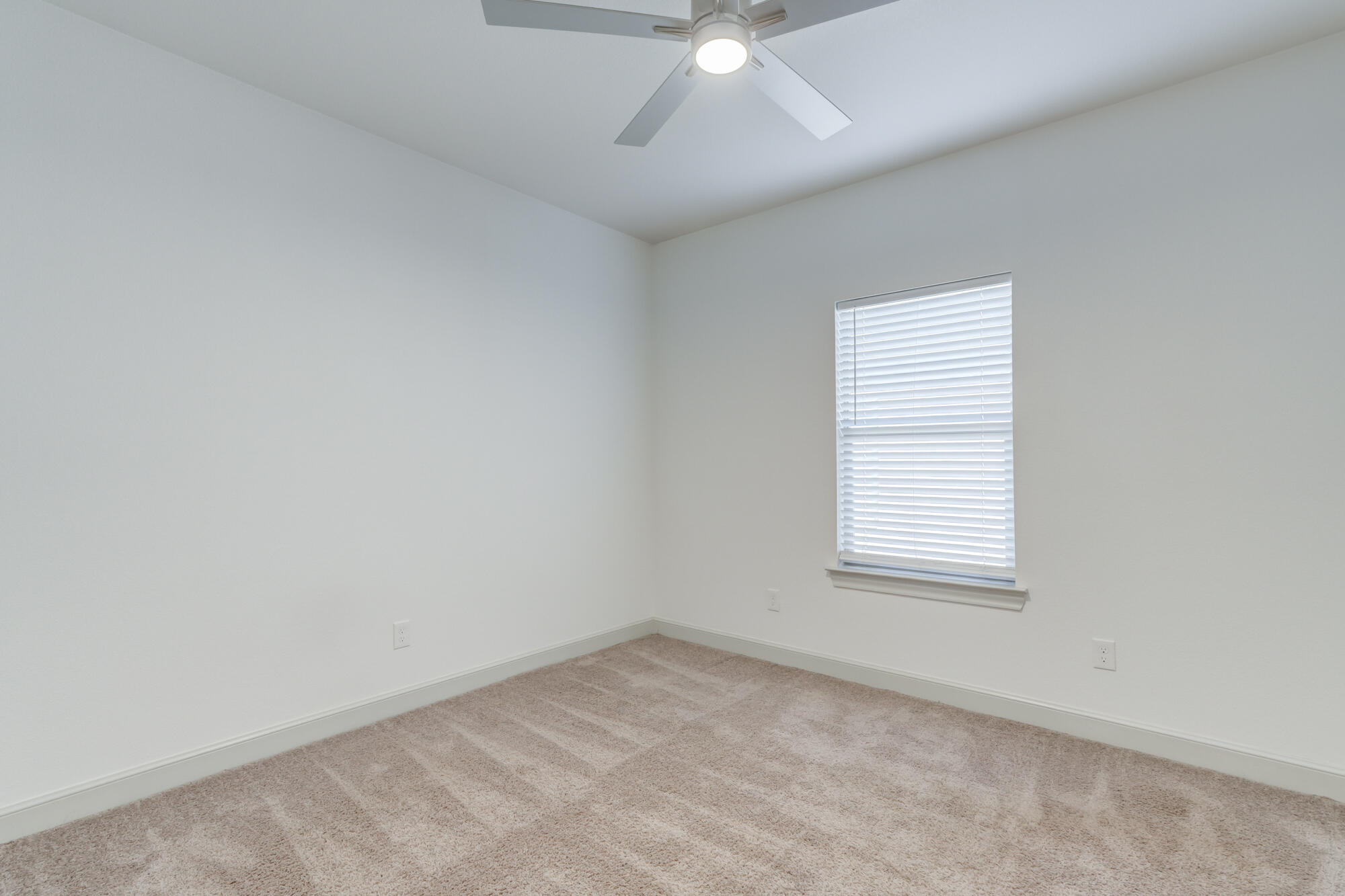 6805 51st Street Lubbock, TX 79407 - Photo 35 of 41 an empty room with a window