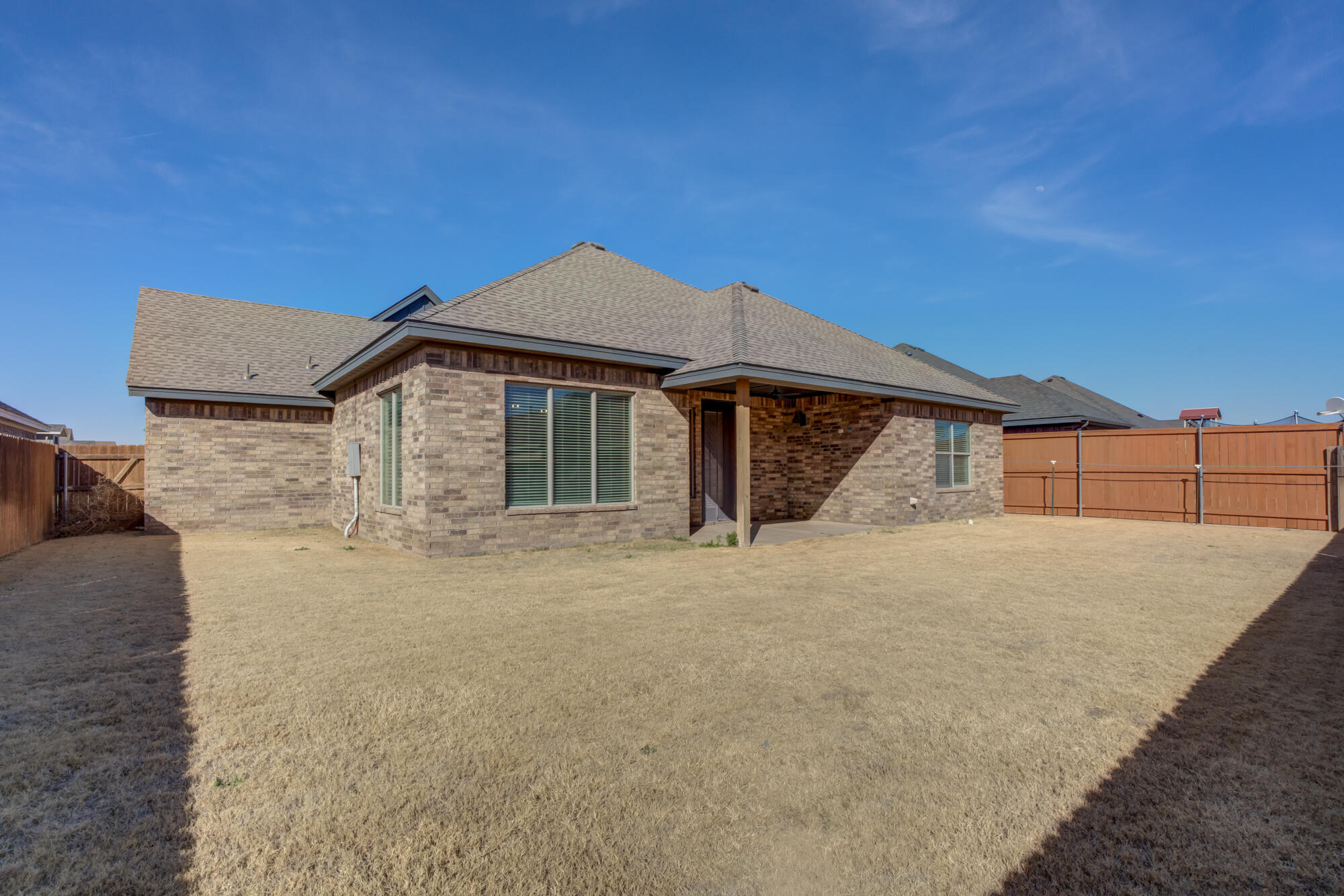 6805 51st Street Lubbock, TX 79407 - Photo 41 of 41 a house with trees in front of it
