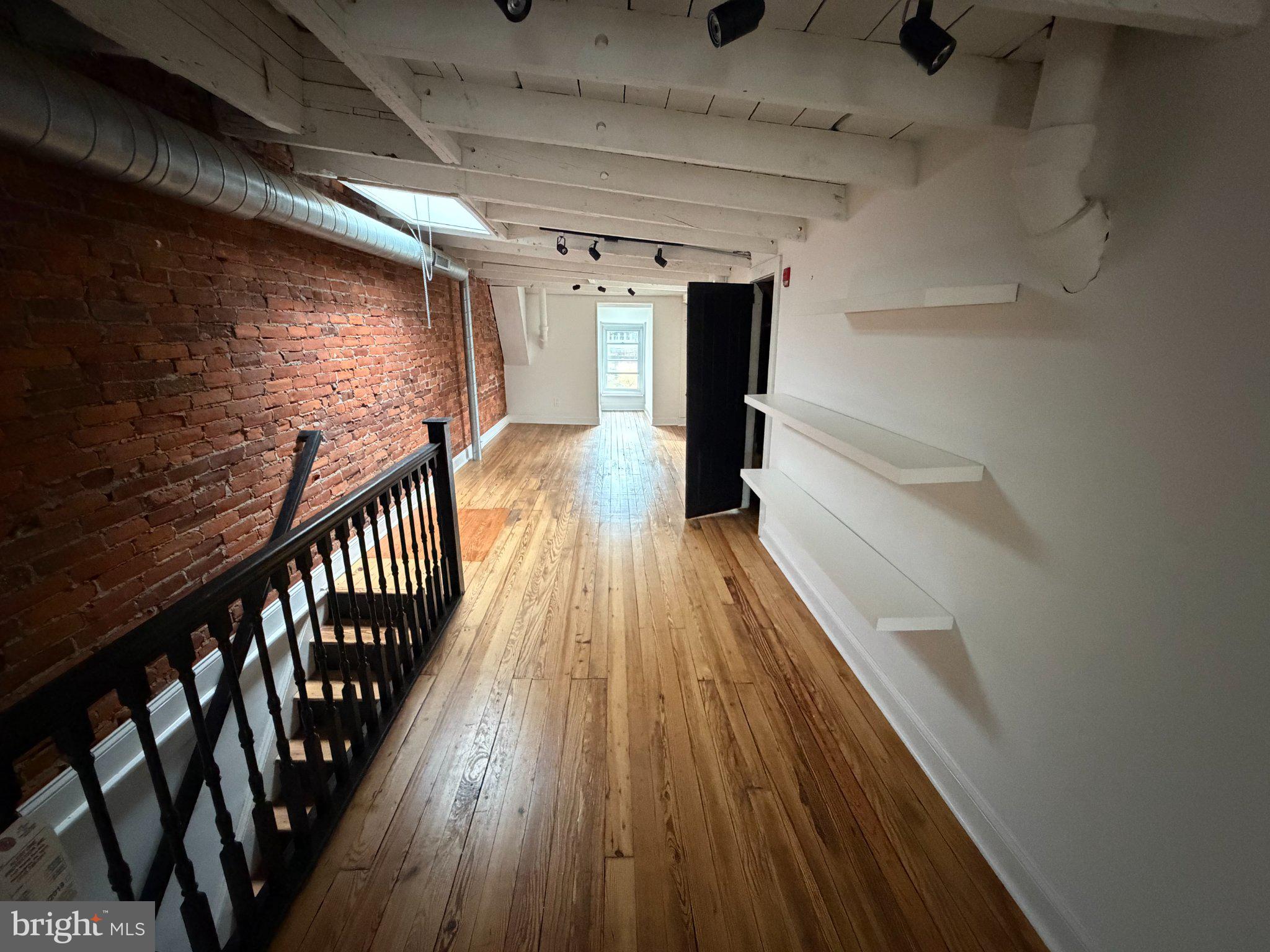 815 South 49th Street Philadelphia, PA 19143 - Photo 52 of 72 Charming loft with exposed brick walls.