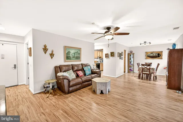 a kitchen with stainless steel appliances a refrigerator stove and microwave