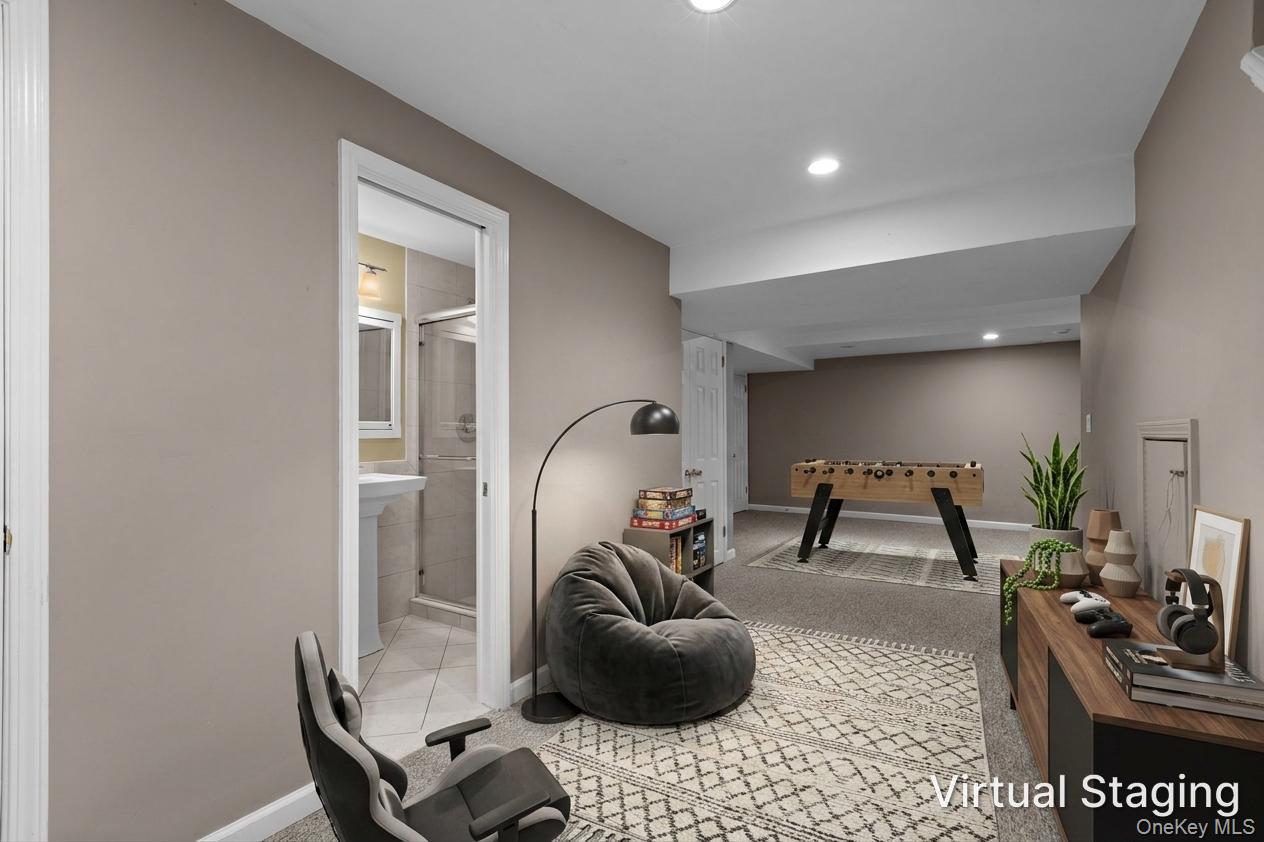 2211 Crompond Road Yorktown Heights, NY 10598 - Photo 23 of 38 a bedroom with furniture and a mirror
