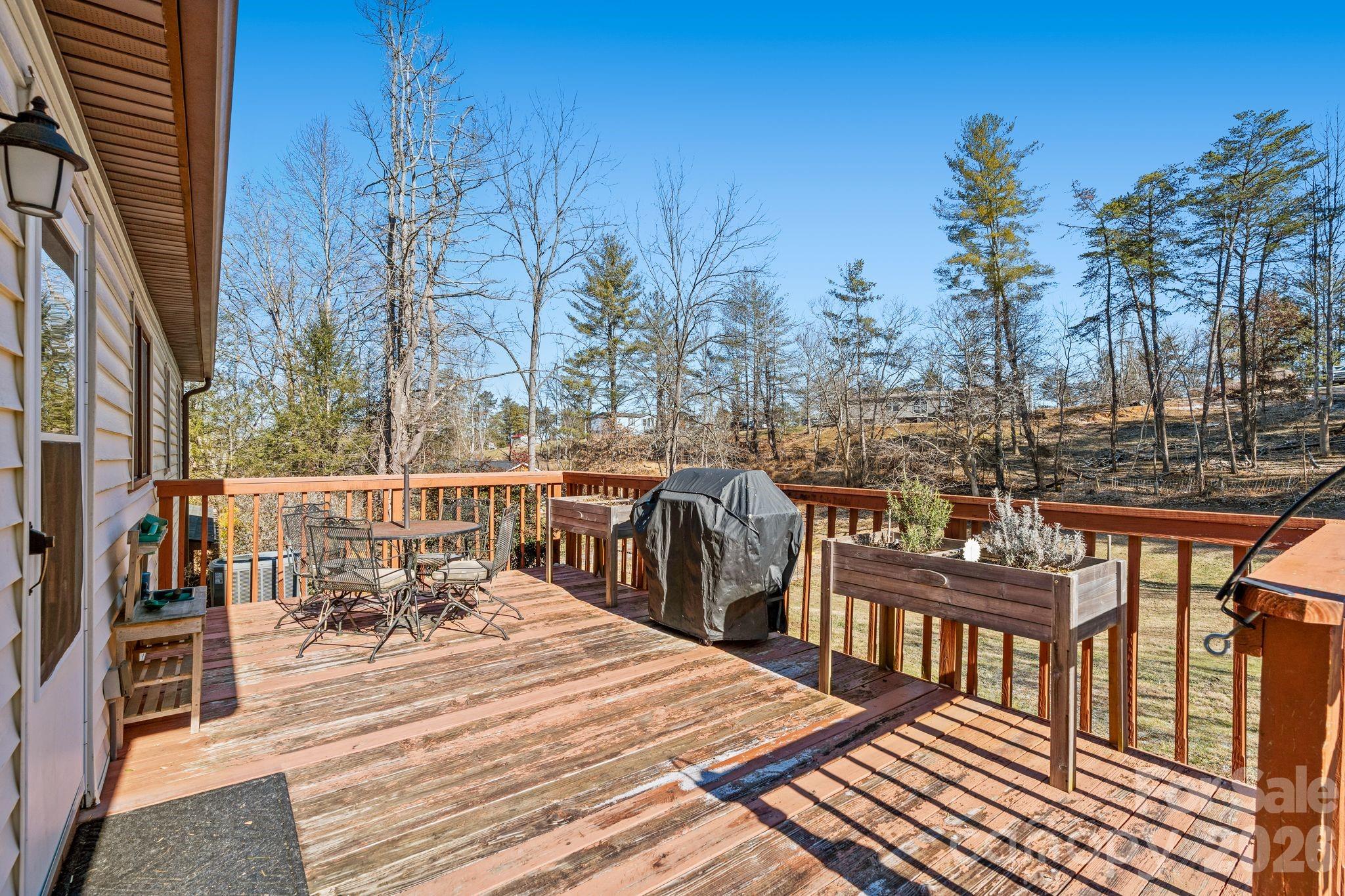 1348 Jenkins Valley Road Alexander, NC 28701 - Photo 21 of 44 a view of a balcony with chairs