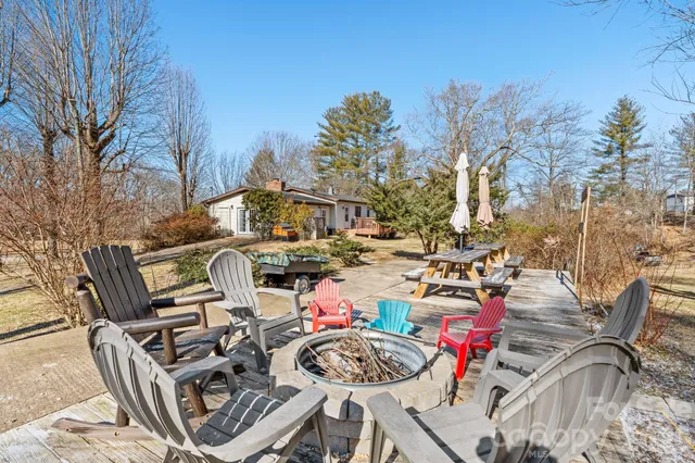 a view of a chairs and tables in patio