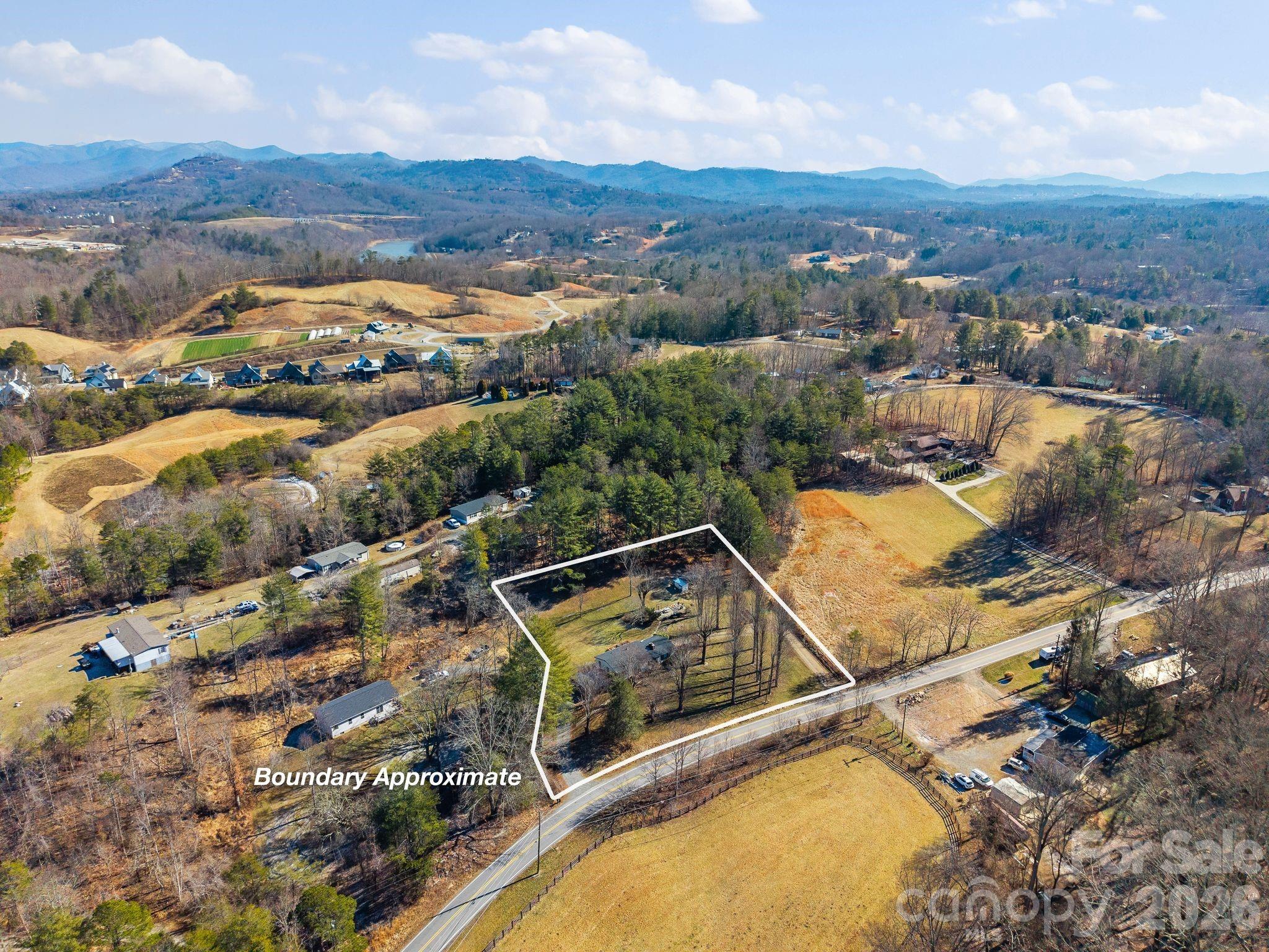 1348 Jenkins Valley Road Alexander, NC 28701 - Photo 27 of 44 an aerial view of residential houses with outdoor space