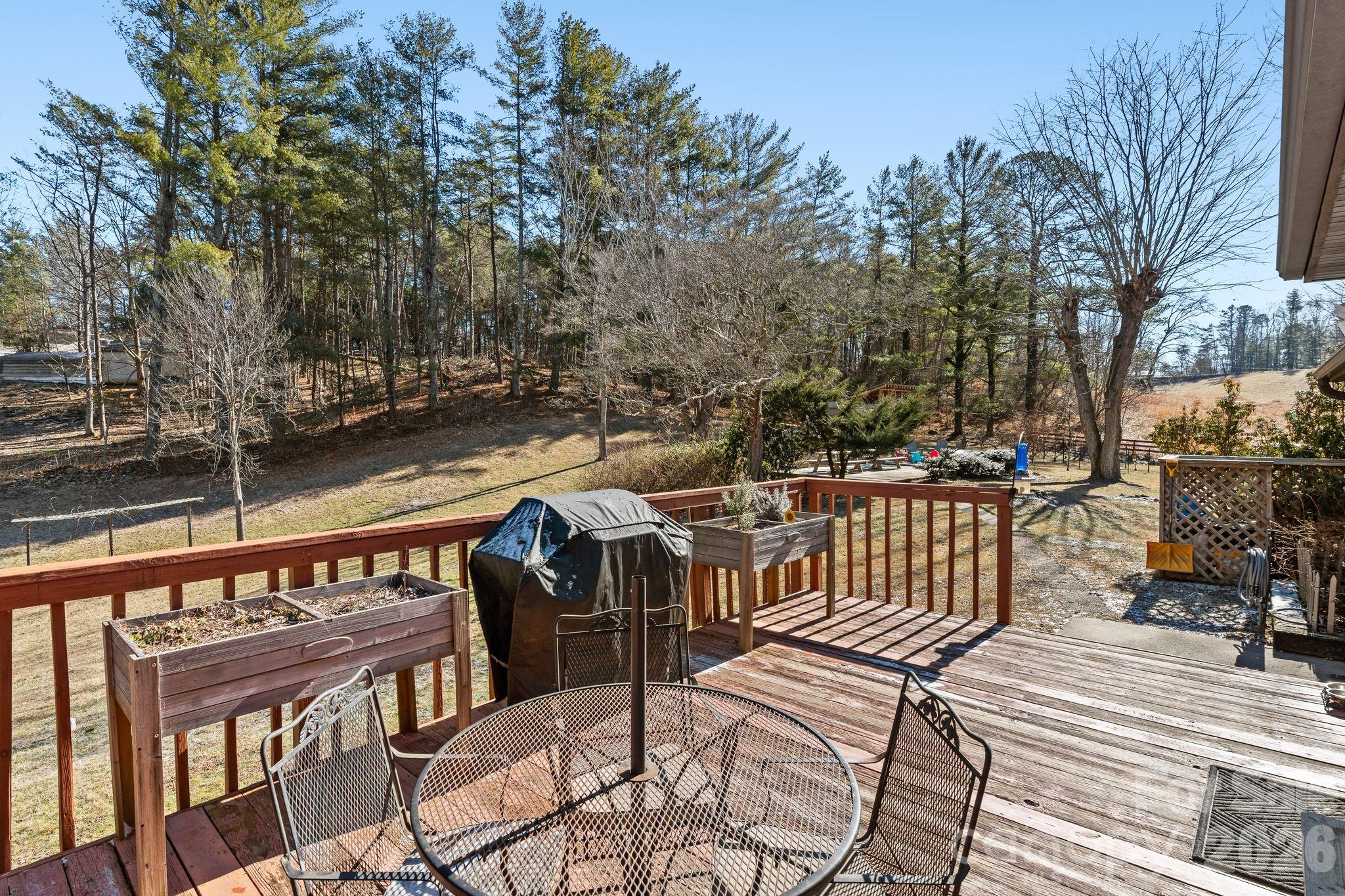 1348 Jenkins Valley Road Alexander, NC 28701 - Photo 29 of 44 a view of a balcony with chairs