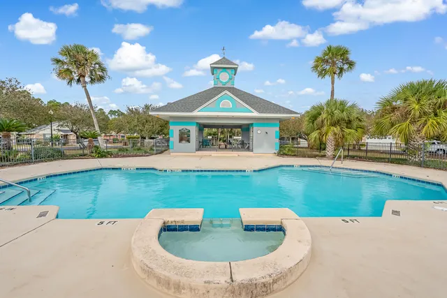a view of a house with a swimming pool