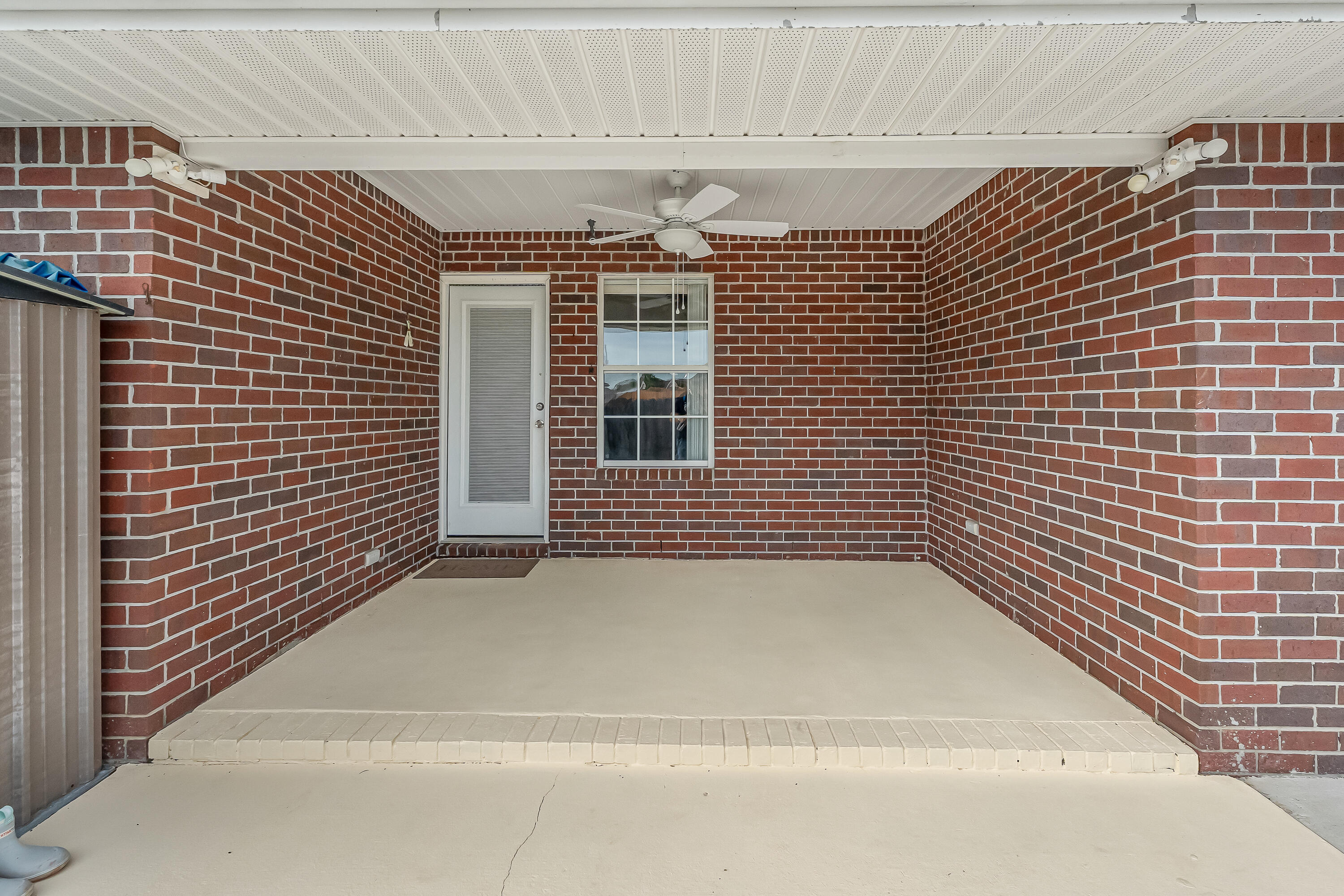 9773 Leeward Way Navarre, FL 32566 - Photo 40 of 43 Covered Porch