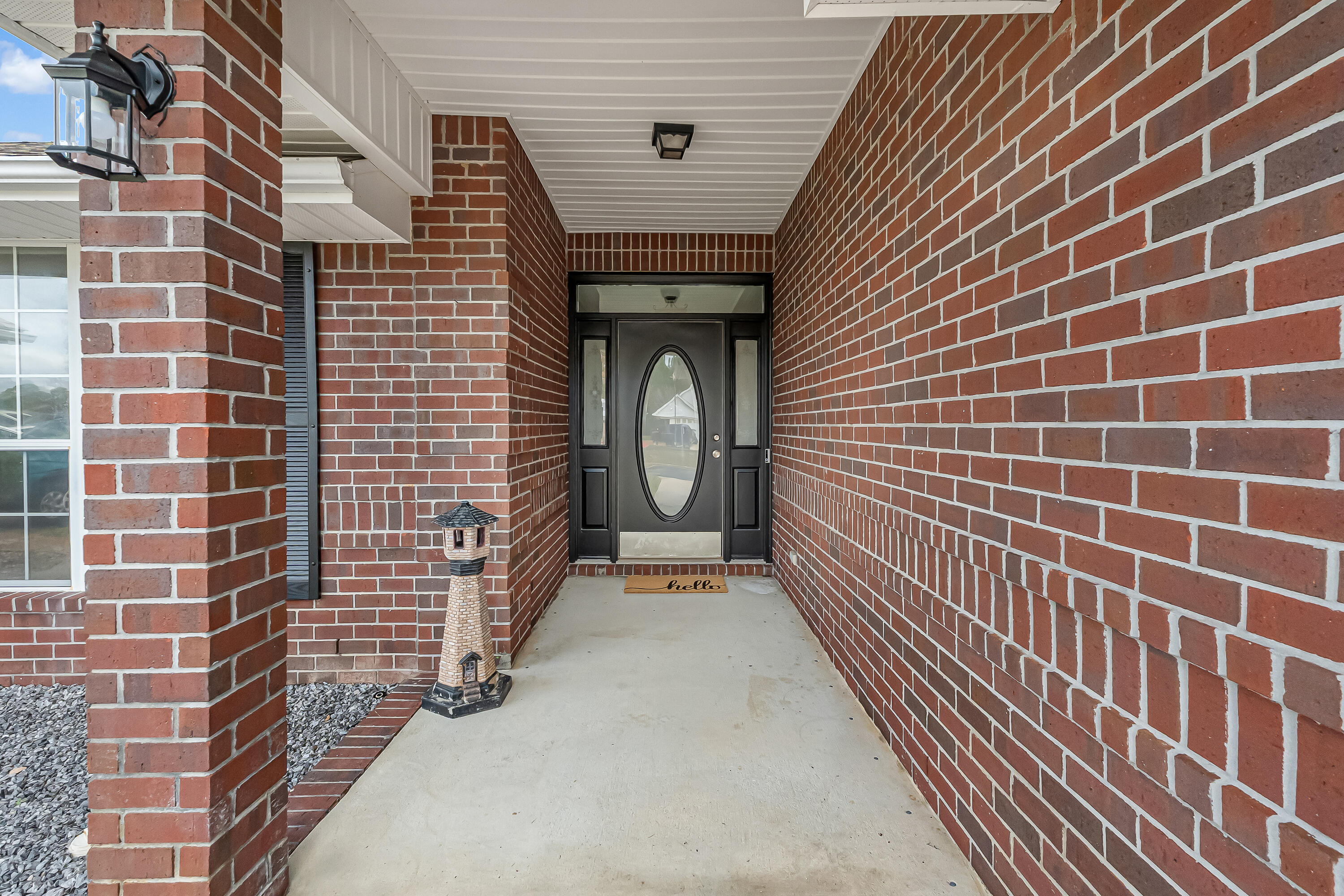 9773 Leeward Way Navarre, FL 32566 - Photo 4 of 43 Covered Front Porch