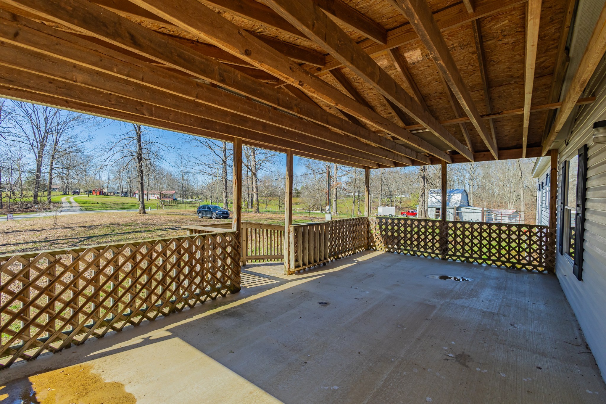 228 Shasteen Ridge Road Lynchburg, TN 37352 - Photo 7 of 53 a view of a backyard with wooden fence