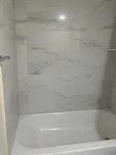 a bathroom with bathtub