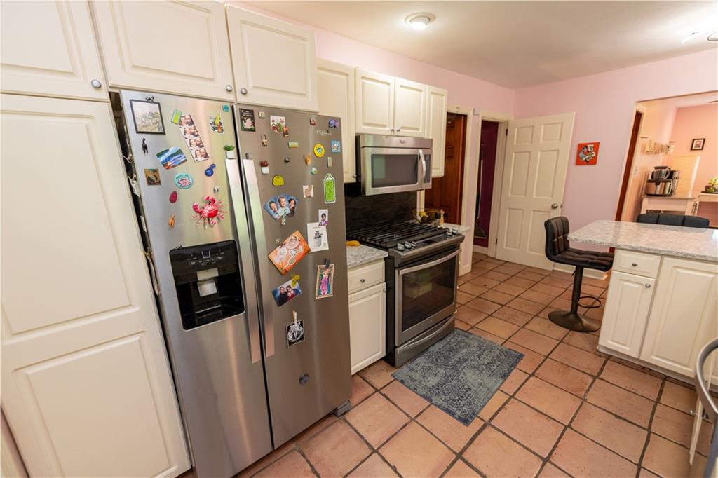 108 Cascade Road Pittsburgh, PA 15221 - Photo 18 of 42 a view of a refrigerator and storage