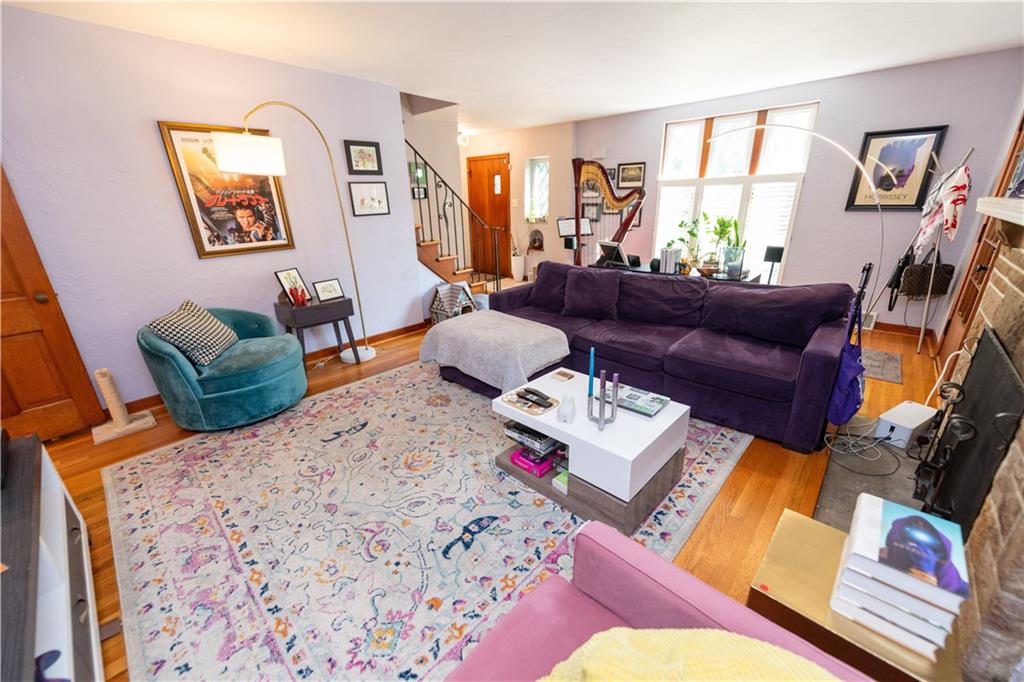 108 Cascade Road Pittsburgh, PA 15221 - Photo 7 of 42 a living room with furniture and a potted plant