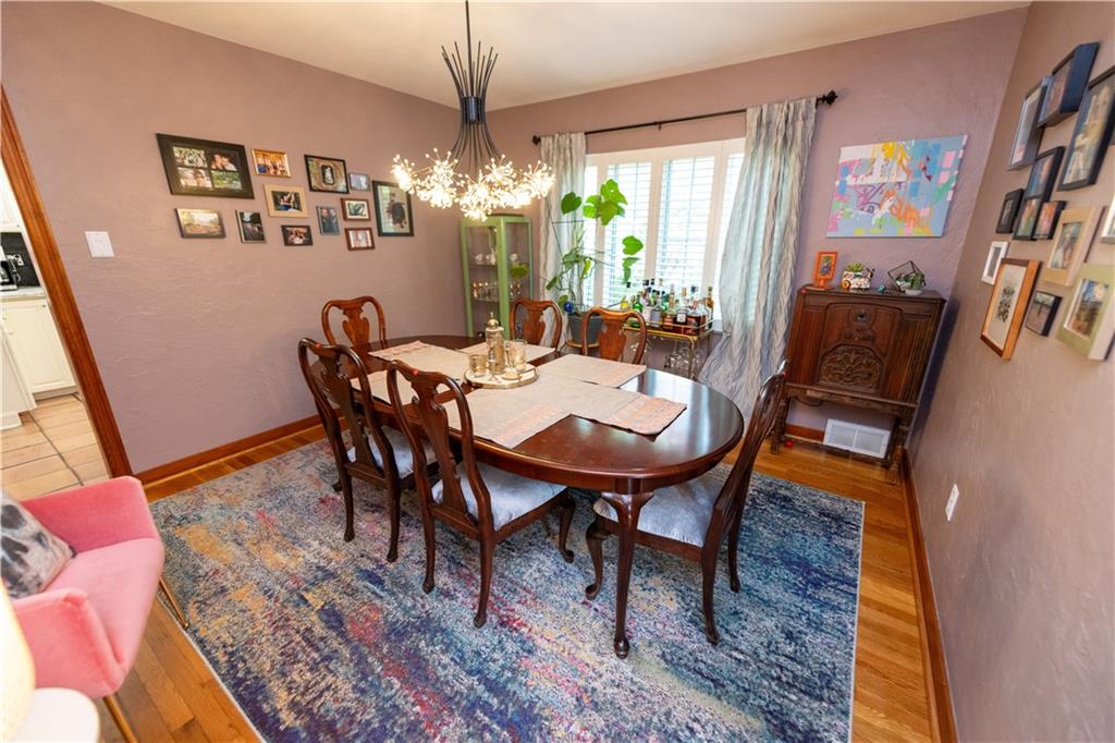 108 Cascade Road Pittsburgh, PA 15221 - Photo 9 of 42 a view of a dining room with furniture and chandelier