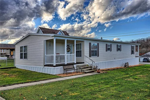 a house view with a garden space