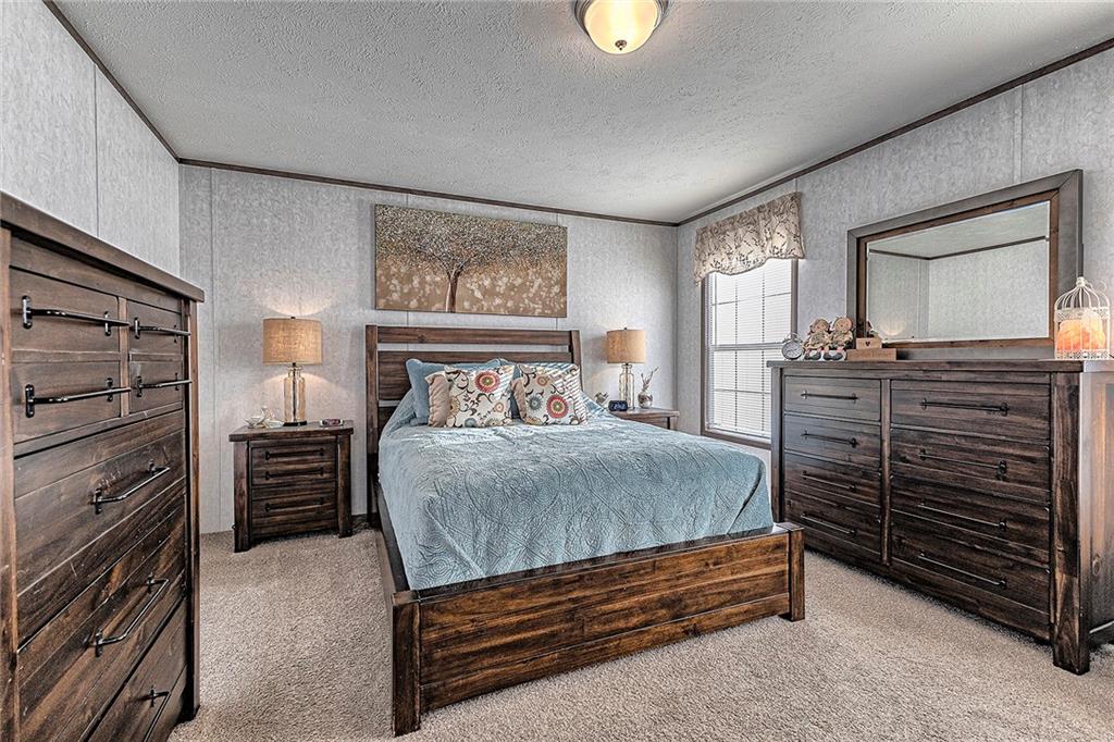 104 Clifton Street Derry, PA 15627 - Photo 11 of 35 a bedroom with a bed and furniture