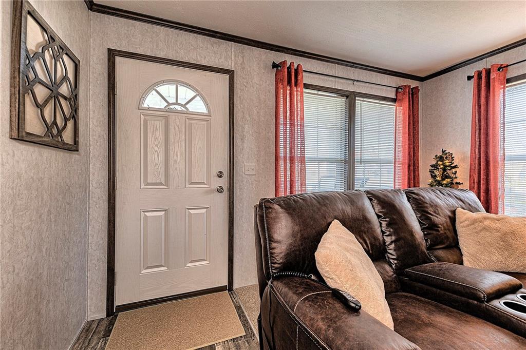 104 Clifton Street Derry, PA 15627 - Photo 20 of 35 a living room with furniture and a window