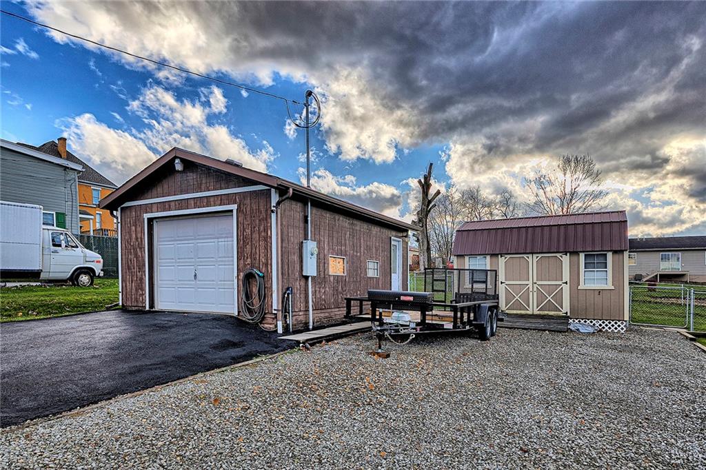 104 Clifton Street Derry, PA 15627 - Photo 31 of 35 a car parked in front of a house