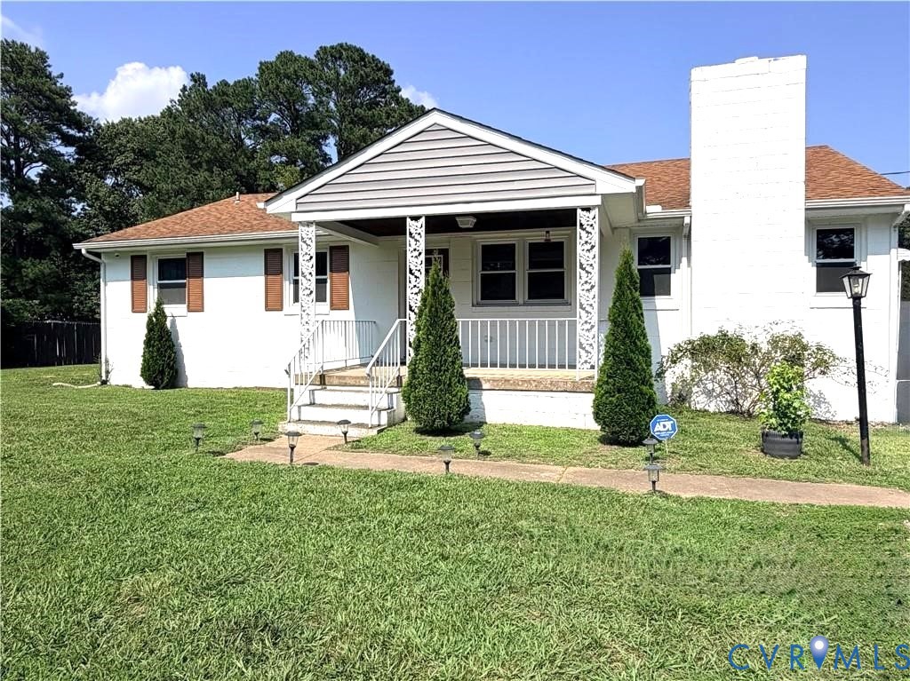 7547 Media Park Road Henrico, VA 23231 - Photo 1 of 21 White exterior residence featuring a front porch w