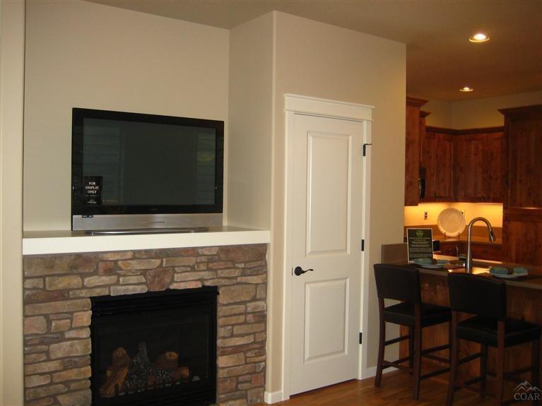20803 Smoke Stack Lane, Unit 57 Bend, OR 97701 - Photo 3 of 19 Gas fireplace with TV niche above, stora