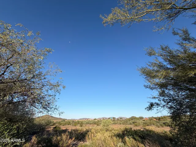 a front view of a house with parking space