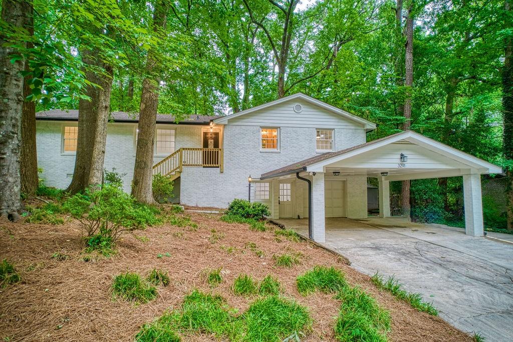 3291 Francine Drive Decatur, GA 30033 - Photo 1 of 1 a front view of a house with garden