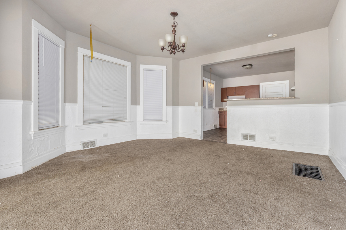 631 East 142nd Street Dolton, IL 60419 - Photo 22 of 29 a view of empty room with a ceiling fan