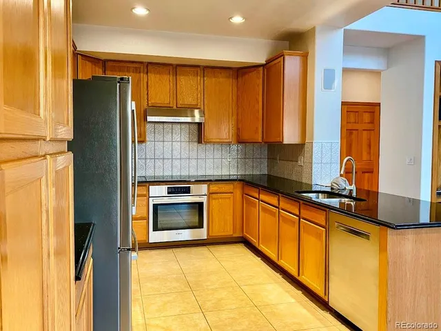 a view of a kitchen with furniture and kitchen view