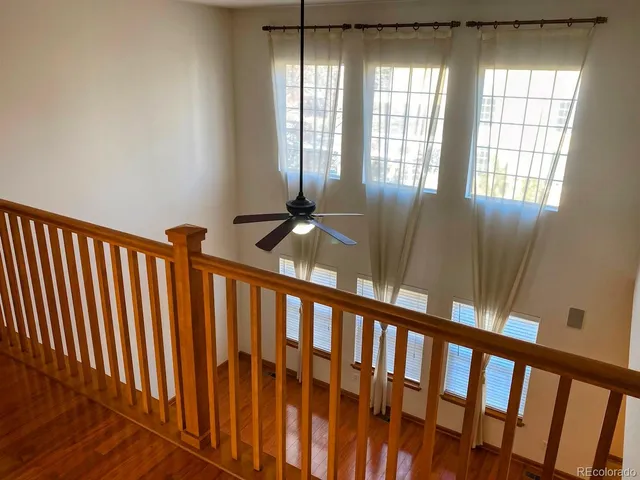 a view of an entryway with wooden floor