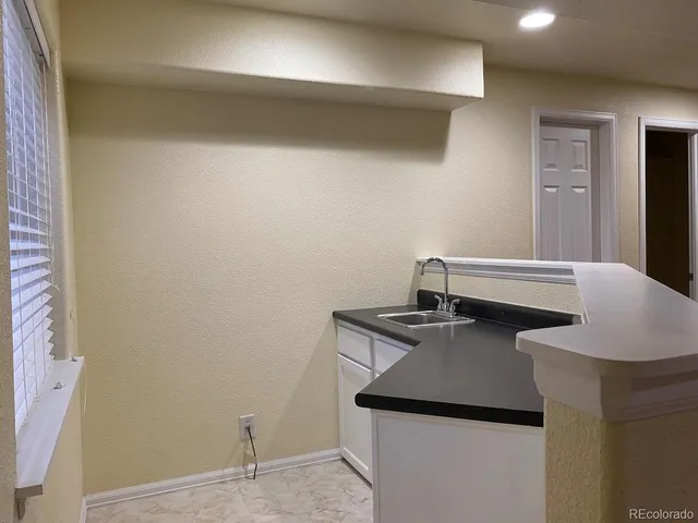 a view of a room with an empty space