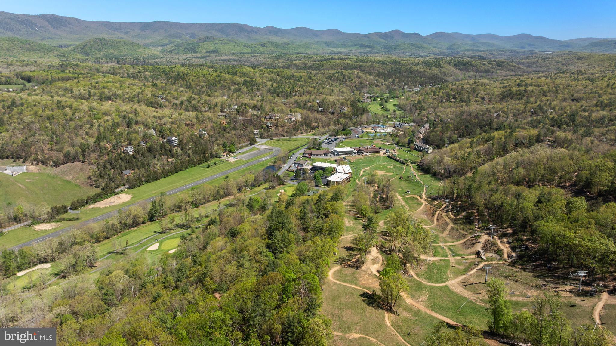 Alum Springs Road Basye, VA 22810 - Photo 49 of 63 a view of a lush green field with mountains in the background