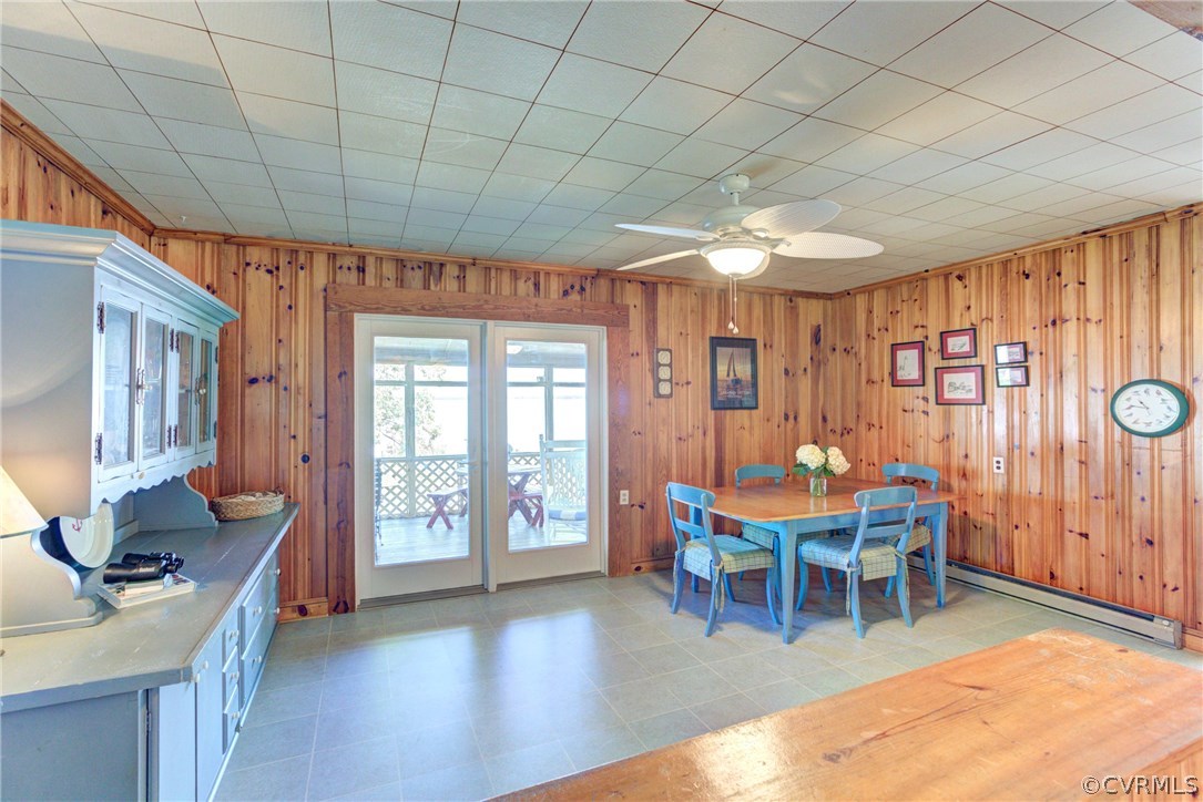 528 Old Mill Point Road Laneview, VA 22504 - Photo 11 of 30 a dining room with furniture and wooden floor