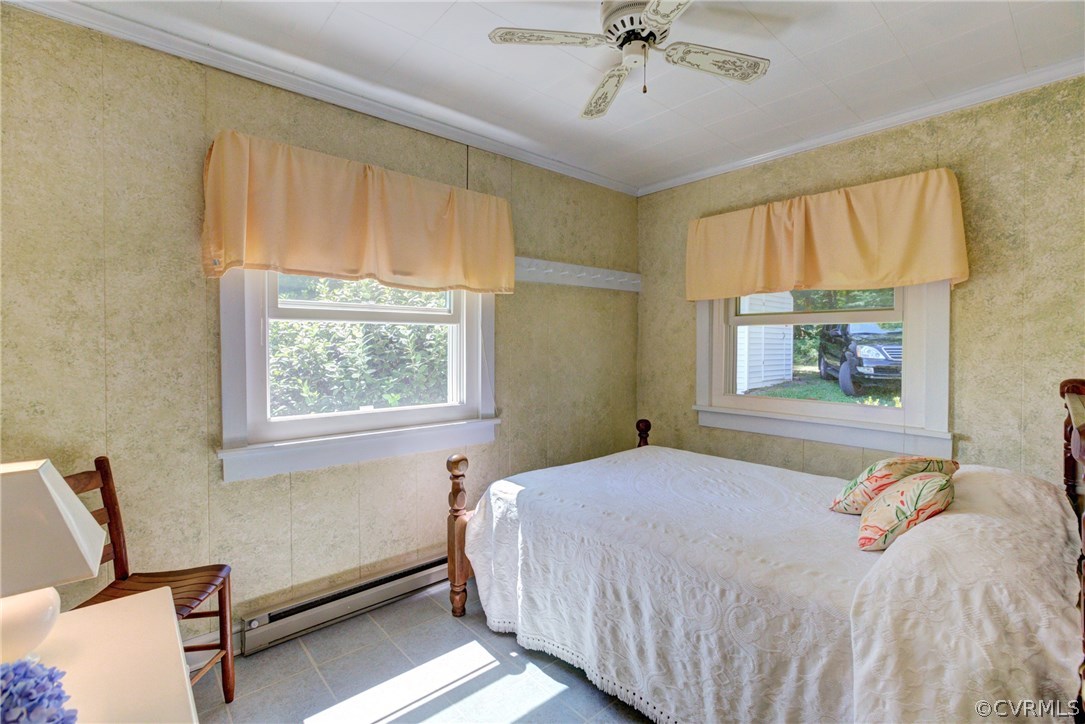 528 Old Mill Point Road Laneview, VA 22504 - Photo 16 of 30 a bedroom with a bed and window