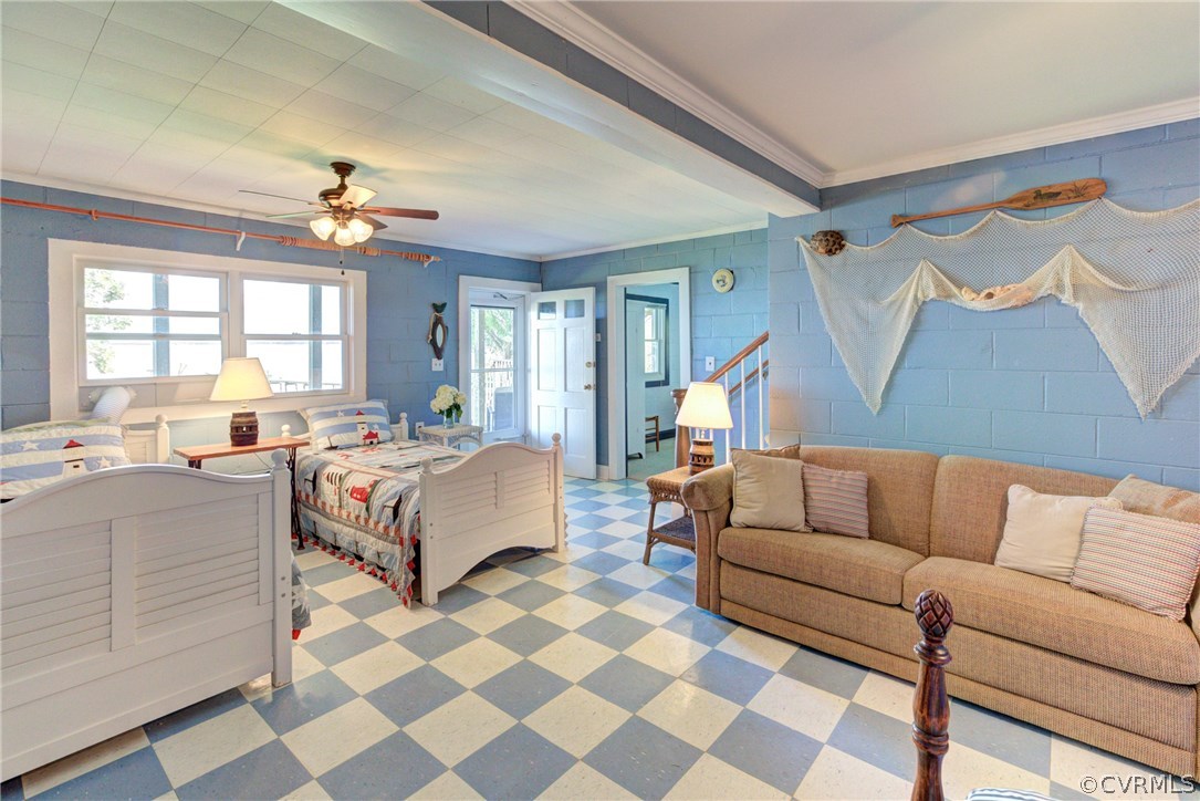528 Old Mill Point Road Laneview, VA 22504 - Photo 19 of 30 a spacious bedroom with a bed and a couch