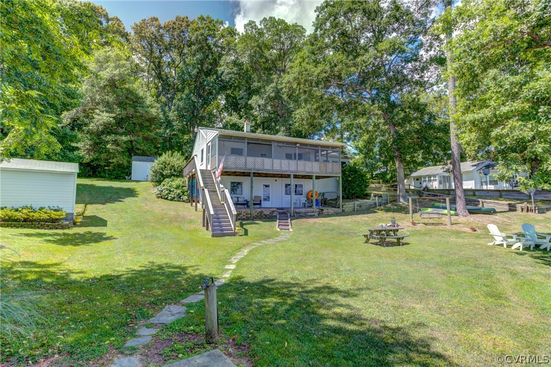 528 Old Mill Point Road Laneview, VA 22504 - Photo 7 of 30 a view of a house with backyard and sitting area