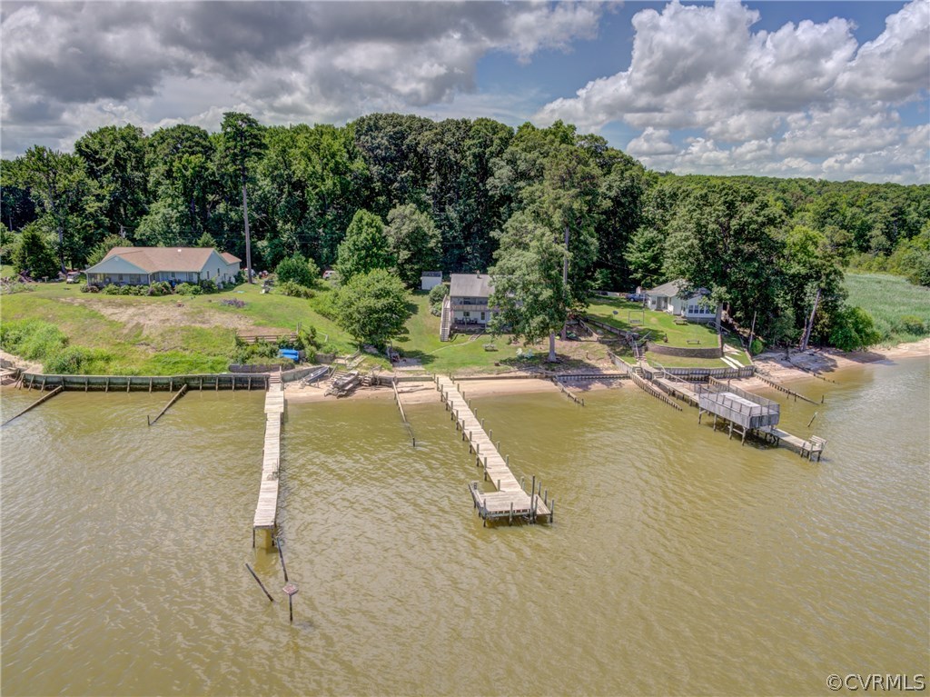 528 Old Mill Point Road Laneview, VA 22504 - Photo 8 of 30 a view of a lake with a yard