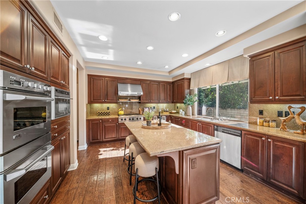 2241 Redwood Drive Glendora, CA 91741 - Photo 19 of 68 a kitchen with a stove a sink and a refrigerator