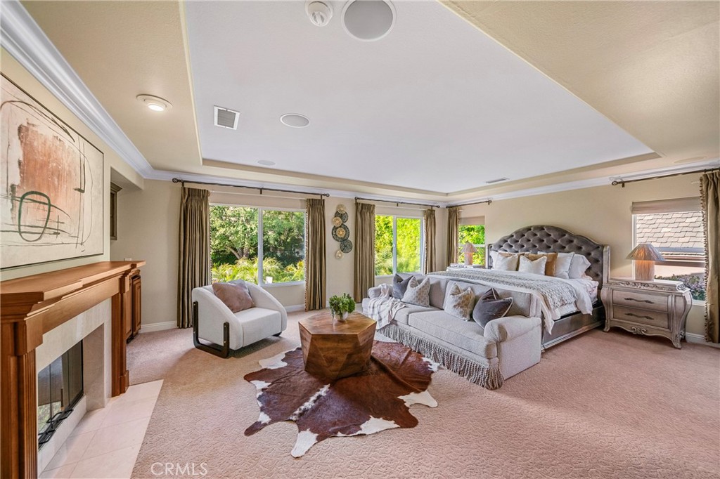 2241 Redwood Drive Glendora, CA 91741 - Photo 26 of 68 a spacious bedroom with a bed and glass windows
